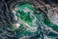 Blue waves of water of the river and the sea meet each other during high tide and low tide. - PhotoDune Item for Sale