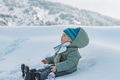 Cute Baby Boy Playing in Snow Wearing Warm Winter Clothes - PhotoDune Item for Sale