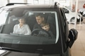 family choosing a car in dealership, they want the most comfortable and safe car - PhotoDune Item for Sale