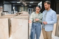 Couple exploring ceramic tile options in store - PhotoDune Item for Sale