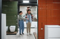 Family choosing bathroom fixtures in plumbing store - PhotoDune Item for Sale