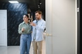 Couple choosing interior doors in a furniture store - PhotoDune Item for Sale