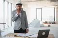 Arab architect using walkie talkie on construction site - PhotoDune Item for Sale