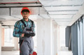 Arab engineer installing ventilation system on construction site - PhotoDune Item for Sale