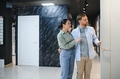 Couple choosing interior doors in a hardware store - PhotoDune Item for Sale