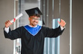 Happy arab student celebrating graduation from university with diploma - PhotoDune Item for Sale