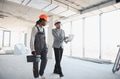 Architect showing laptop to builder during construction inspection - PhotoDune Item for Sale