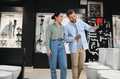 Couple choosing bathroom fixtures in plumbing store - PhotoDune Item for Sale