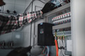 Electrician repairing electrical panel in building under construction - PhotoDune Item for Sale