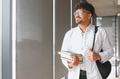 Medical student studying by university window - PhotoDune Item for Sale