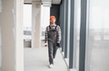 Construction worker walking in building under construction - PhotoDune Item for Sale