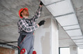 Construction worker installing air conditioning and ventilation system - PhotoDune Item for Sale