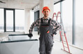 Construction worker installing ventilation system in building - PhotoDune Item for Sale