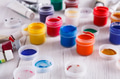 Artist workplace, set of color paints on wood desk - PhotoDune Item for Sale