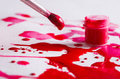 Brush and paint jar in hands. Artist creating watercolor painting - PhotoDune Item for Sale