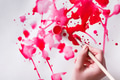 Brush and paint jar in hands. Artist creating watercolor painting - PhotoDune Item for Sale