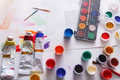 Artist workplace, set of color paints on wood desk - PhotoDune Item for Sale