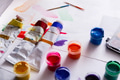 Artist workplace, set of color paints on wood desk - PhotoDune Item for Sale