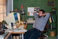 Caucasian Man Relaxing at Desk in Retro Office Environment - PhotoDune Item for Sale