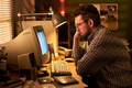 Caucasian Man Working Late Night at Desk with Vintage Computer - PhotoDune Item for Sale