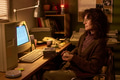 Caucasian Woman Sitting at Desk Using Vintage Desktop Computer - PhotoDune Item for Sale