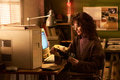 Caucasian Woman Using Vintage Computer and Handling Floppy Disks - PhotoDune Item for Sale