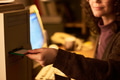 Caucasian Woman Inserting Floppy Disk into Desktop Computer - PhotoDune Item for Sale