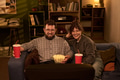 Caucasian Man and Caucasian Woman Watching Movie and Smiling - PhotoDune Item for Sale
