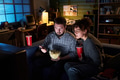 Caucasian Man and Woman Watching Movie and Eating Popcorn Together - PhotoDune Item for Sale