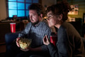 Caucasian Couple Watching Movie and Eating Popcorn Together - PhotoDune Item for Sale