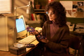 Caucasian Woman Organizing Compact Discs in Vintage Office Setting - PhotoDune Item for Sale