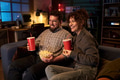 Caucasian Man and Woman Watching Movie and Eating Popcorn Together - PhotoDune Item for Sale