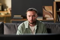 Man Sitting Indoors Watching Television - PhotoDune Item for Sale
