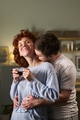 Young Man Hugging Young Woman Enjoying Morning Coffee - PhotoDune Item for Sale