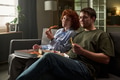 Young Woman and Young Man Eating Pizza and French Fries - PhotoDune Item for Sale