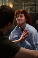 Young Woman Smiling While Touching Hands with Young Man Indoors - PhotoDune Item for Sale