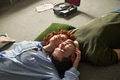 Young Couple Relaxing Together on Floor Listening to Vinyl Records - PhotoDune Item for Sale