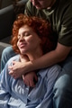 Young Woman Relaxing in Embrace of Young Man Indoors - PhotoDune Item for Sale