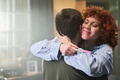 Young Adult Woman Hugging Man While Holding Positive Pregnancy Test - PhotoDune Item for Sale
