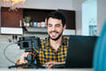 Young Man Doing Web Meeting Using Mirrorless Camera - PhotoDune Item for Sale
