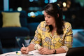 Woman working from home at night - PhotoDune Item for Sale