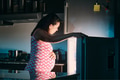 Pregnant woman eating at night - PhotoDune Item for Sale