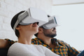 Young Couple Playing With Virtual Reality - PhotoDune Item for Sale