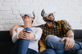 Young Couple Playing With Virtual Reality - PhotoDune Item for Sale