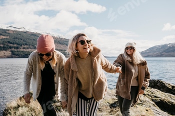 UK, Scotland, happy female friends at Loch Lomond
