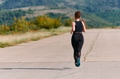 Unstoppable: A Determined Athlete Trains Through the Rain in Pursuit of Marathon Glory - PhotoDune Item for Sale