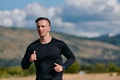 Athletic Man Jogging in the Sun, Preparing His Body for Life's Extreme Challenges - PhotoDune Item for Sale