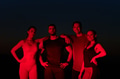 Diverse Athletes Unwind: Post-Marathon Rest Under Red Nighttime Glow. - PhotoDune Item for Sale