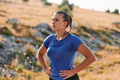 Determined Woman Athlete Preparing for Morning Run - PhotoDune Item for Sale