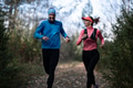 trail running with a sporty couple in the magic forest in early morning - PhotoDune Item for Sale